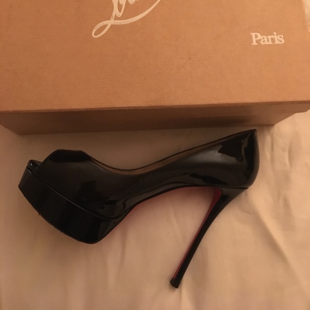 Brand new Christian Louibatons size 8